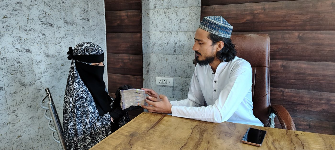 Help given in hand, at the society's own desk, without a queue to stand in.